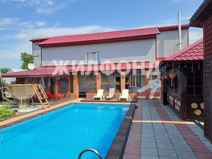 Коттедж 309,1 м² на участке 7 сот.