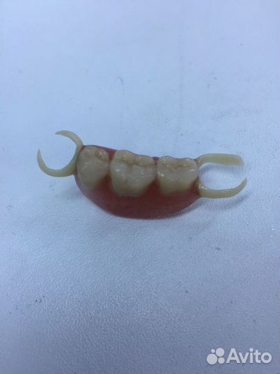 Зубной техник