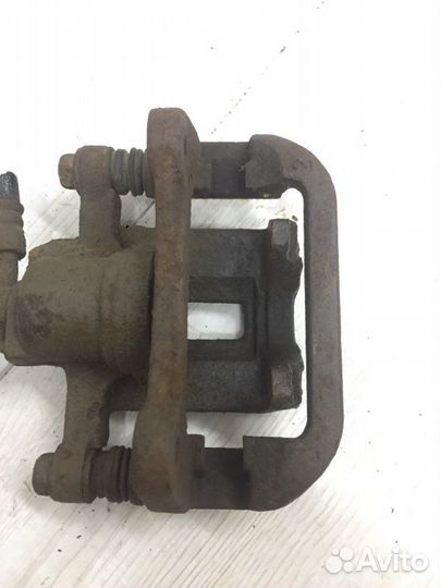 Суппорт задний левый Chevrolet Lacetti седан F14D3