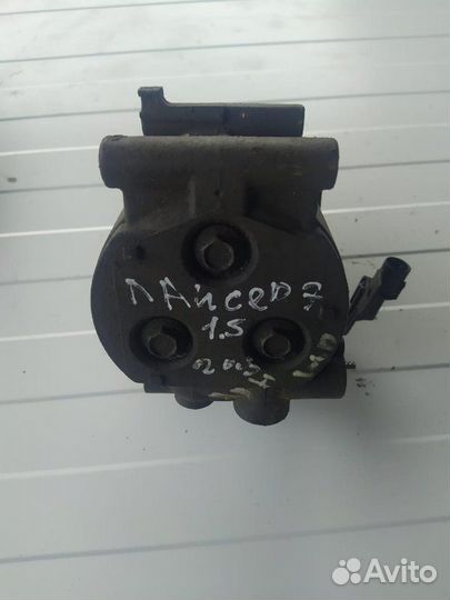 Компрессор кондиционера Mitsubishi Lancer Vii