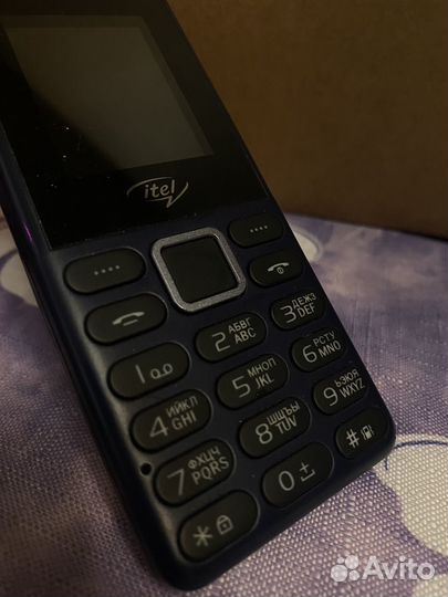 Телефон кнопочный