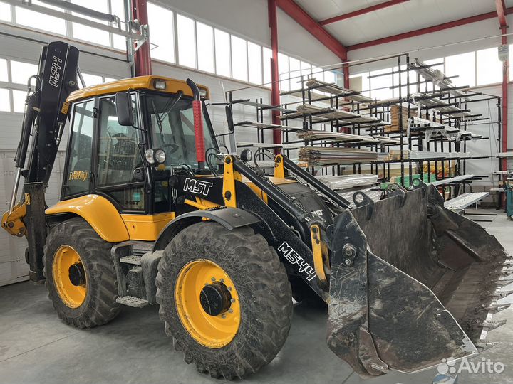 Уборка снега трактором