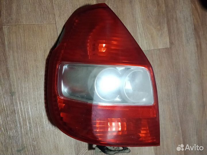 Фонарь задний левый honda fit