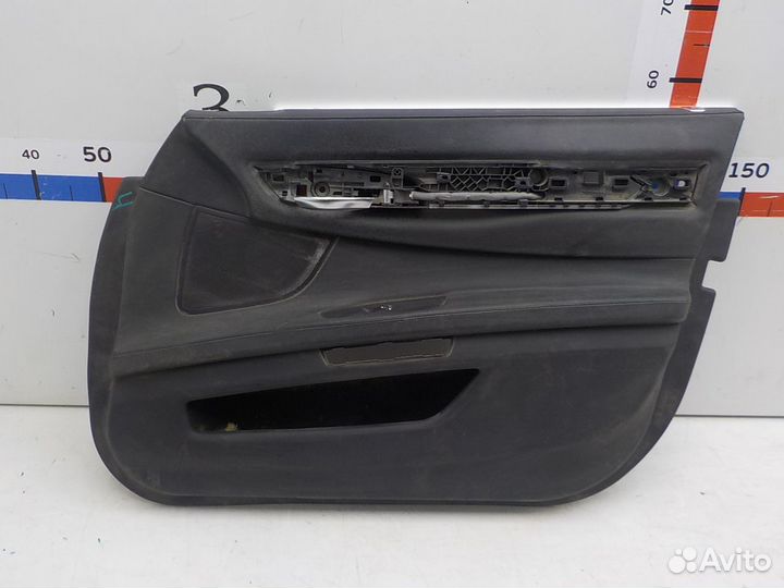 Обшивка двери передней правой на BMW 7