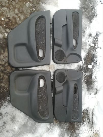 Обшивки дверей Kia Spectra