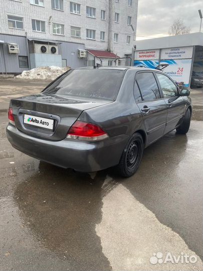 Mitsubishi Lancer 1.6 МТ, 2006, 200 000 км