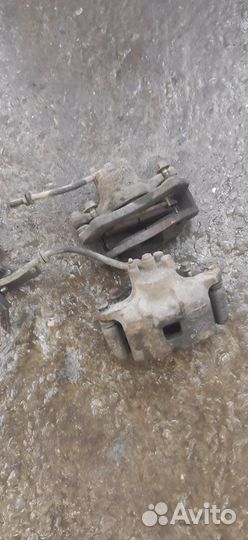 Супорта передние Мицубиси лансер 10