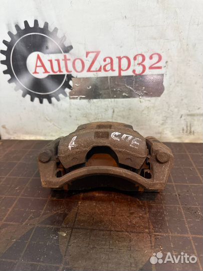 Суппорт передний левый Kia Spectra