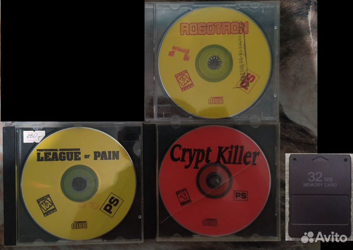 Диски PlayStation 1 и карта памяти PlayStation 2