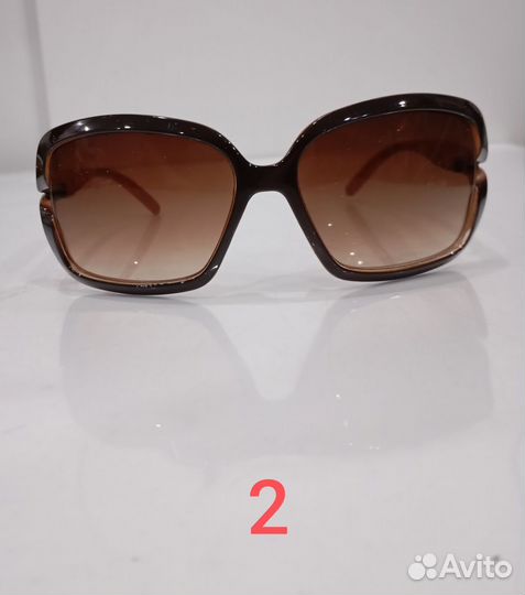 Солнцезащитные очки брендовые