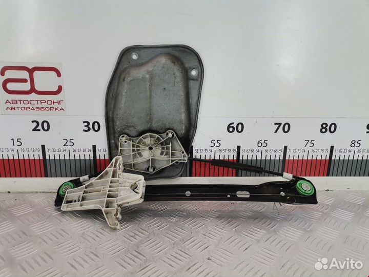 Стеклоподъемник электрический задний левый