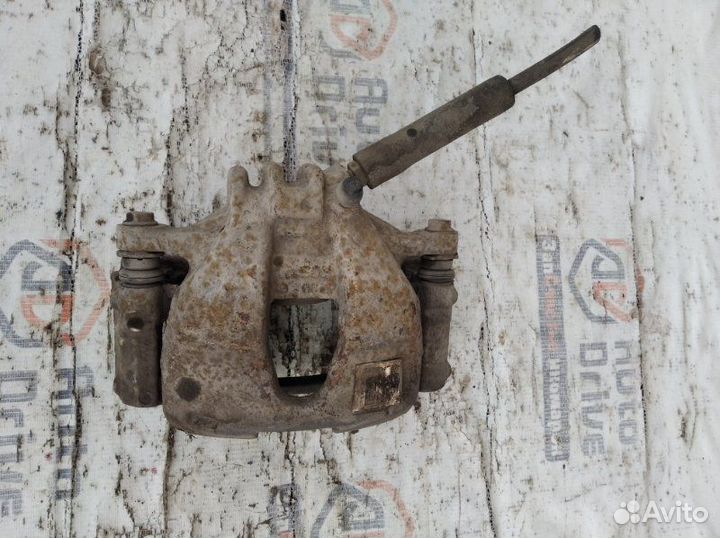 Суппорт тормозной передний левый Peugeot 308 1.6