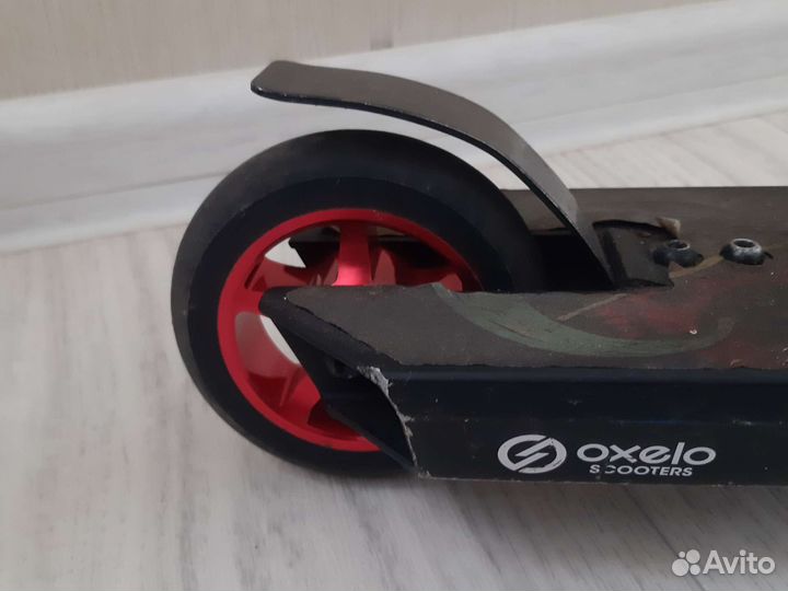 Трюковой самокат oxelo