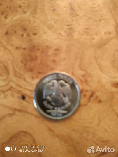 Продам манету