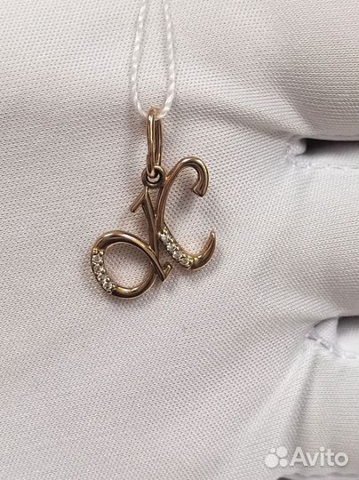 Золотая подвеска с камнем