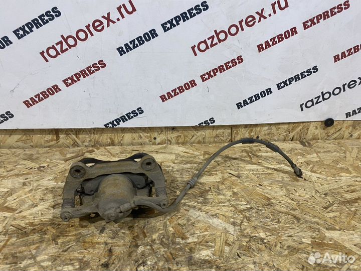 Суппорт тормозной передний левый Skoda Octavia A7