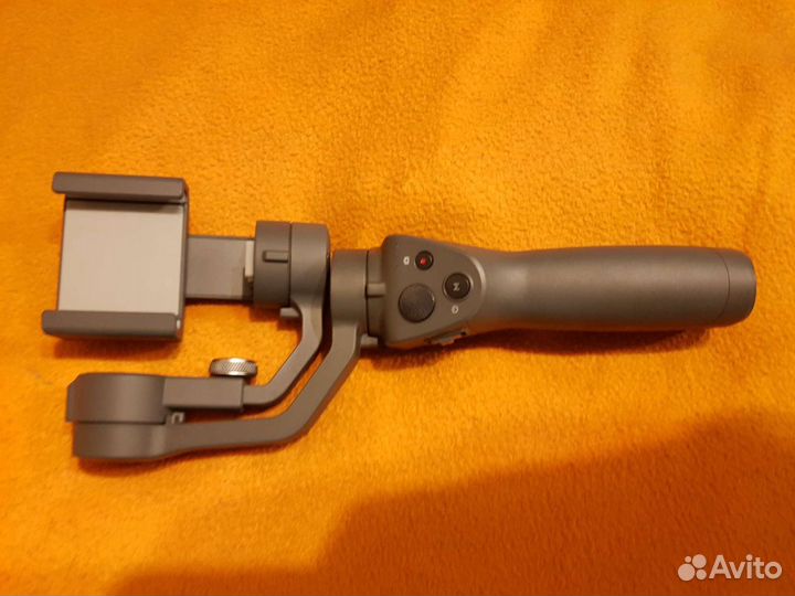 Стабилизатор для съемки смартфоном Dji Osmo Mobile