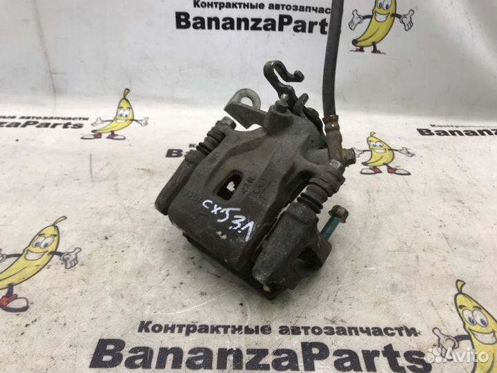 Суппорт тормозной задний левый Mazda Cx-5 KE