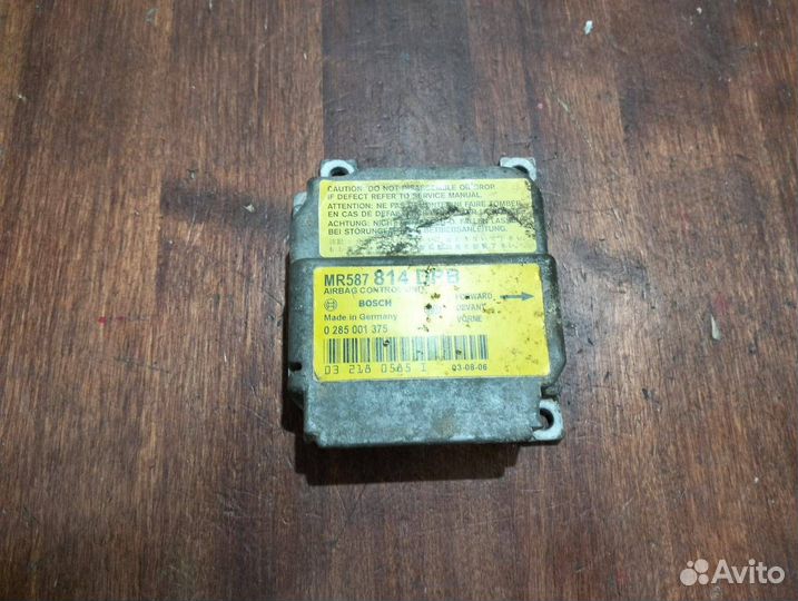 Блок управления подушками безопасности Mitsubishi