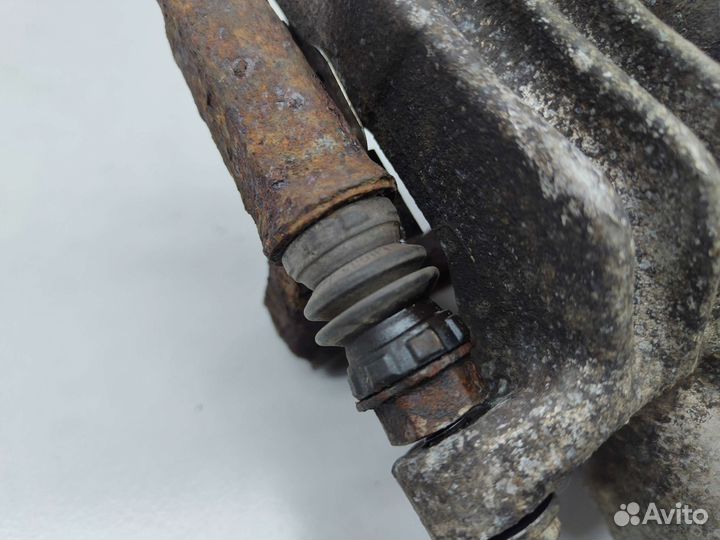 Суппорт тормозной задний левый Volkswagen Golf MK4