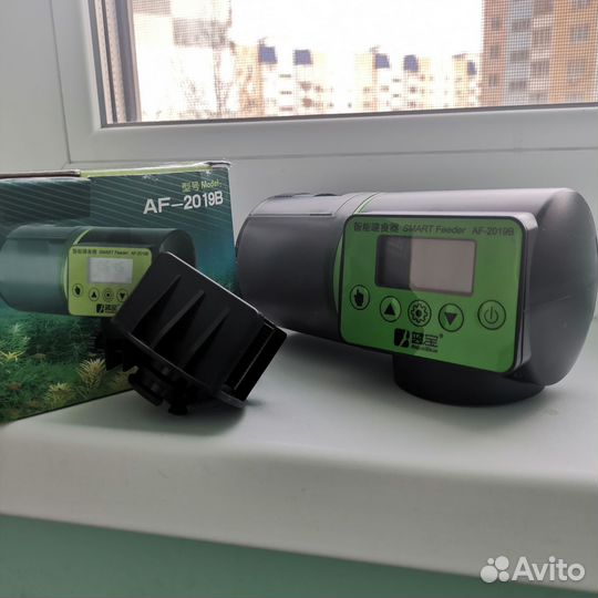 Автоматическая кормушка для рыб