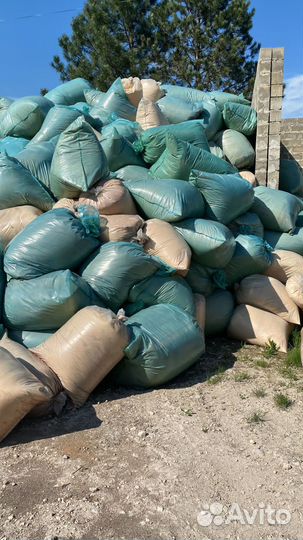 Опилки в мешках