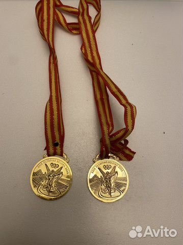 Сувенирная медаль Олимпийских игр 2008