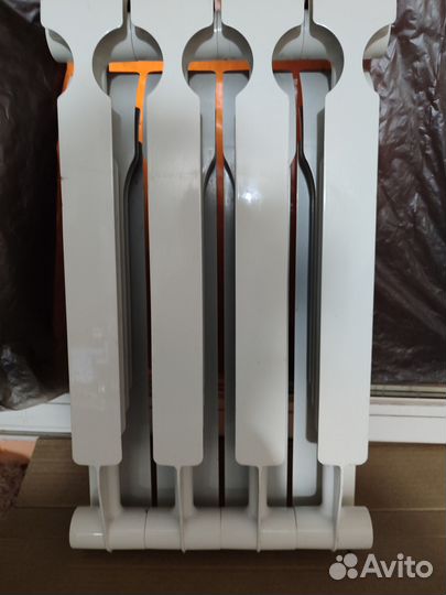 Биметаллический радиатор 4секции