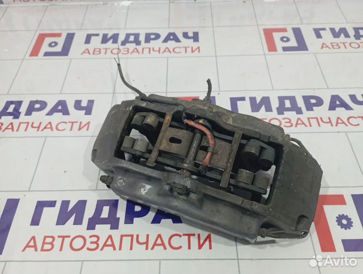 Суппорт тормозной передний правый Volkswagen Touareg (GP) 7L6615124H