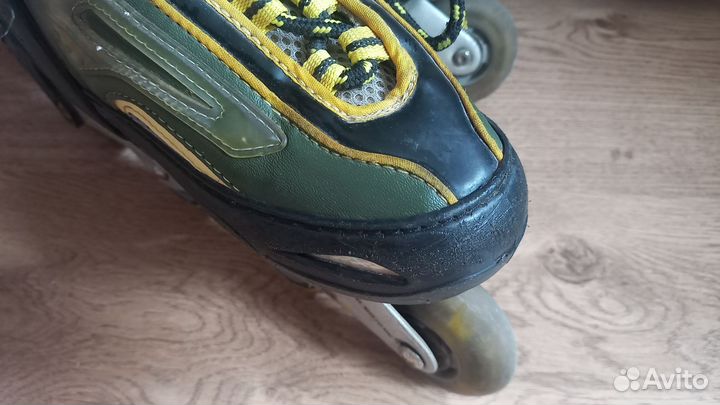 Роликовые коньки