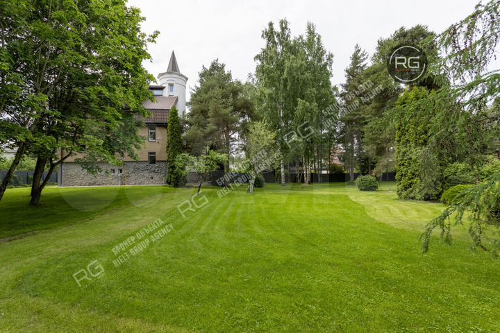 Коттедж 311 м² на участке 35 сот.