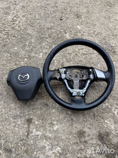 Руль мазда 3