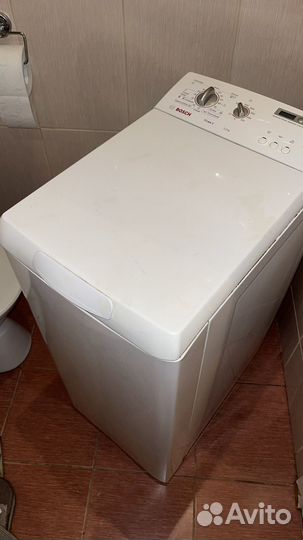 Стиральная машина с вертикальной загрузкой