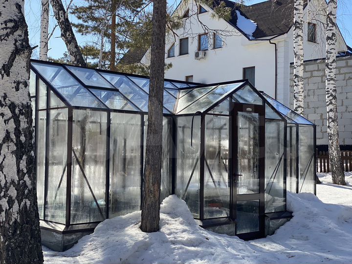 Коттедж 474 м² на участке 20 сот.