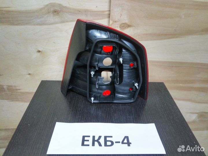 Фонарь левый неоригинал шкода а5