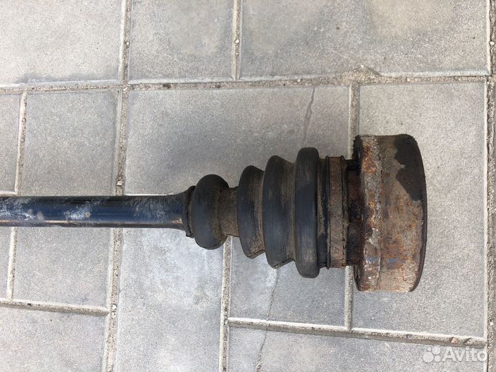 Полуось (привод) задний левый Volkswagen Passat B5