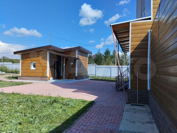 Коттедж 340 м² на участке 15 сот.