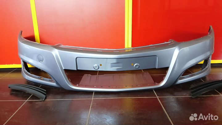 Передний бампер Opel Astra H