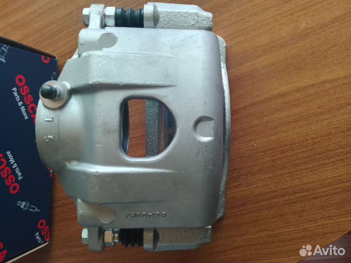 Суппорт передний левый kia, shuma, Sophia