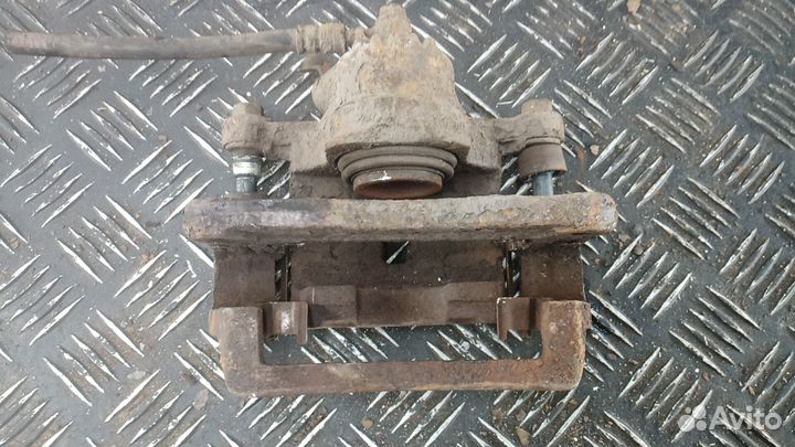 Суппорт тормозной задний правый KIA sorento 1 2009