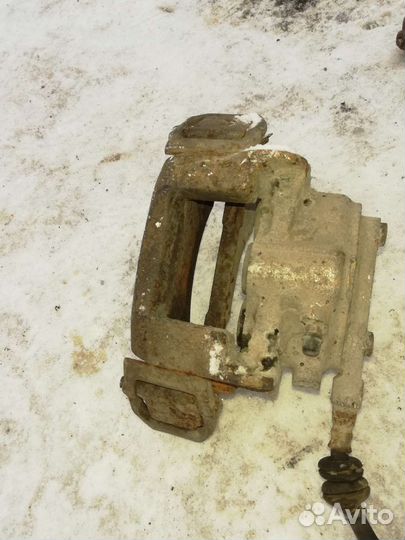 Суппорт тормозной передний Нива Шевроле