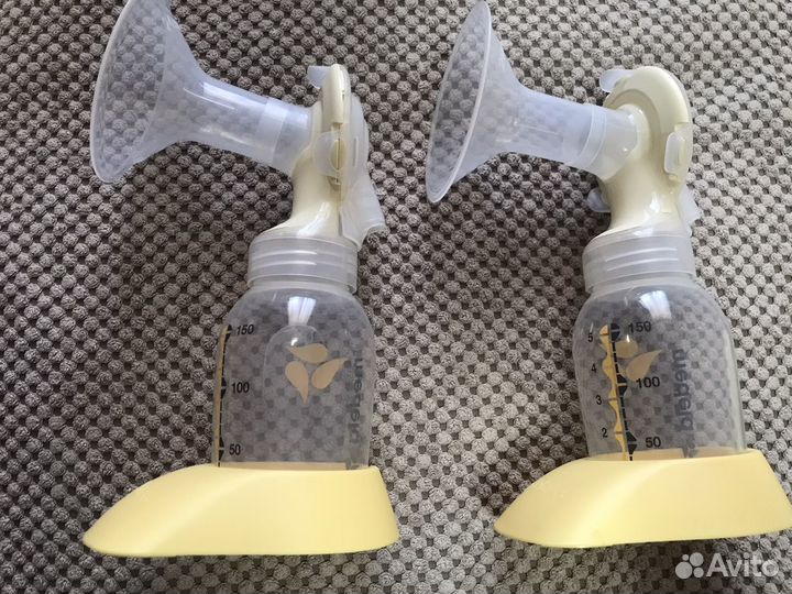 Молокоотсос medela swing maxi