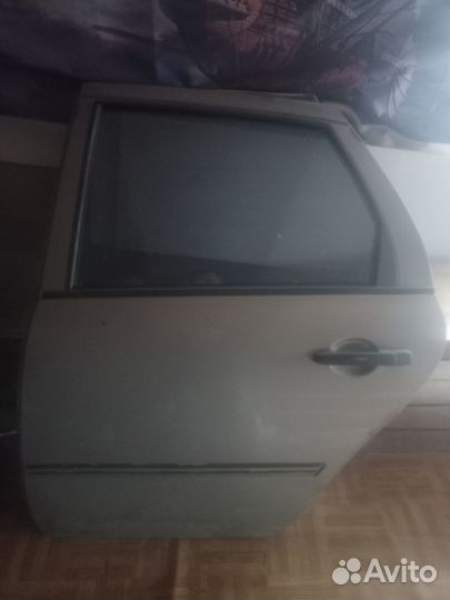 Дверь задняя левая калина