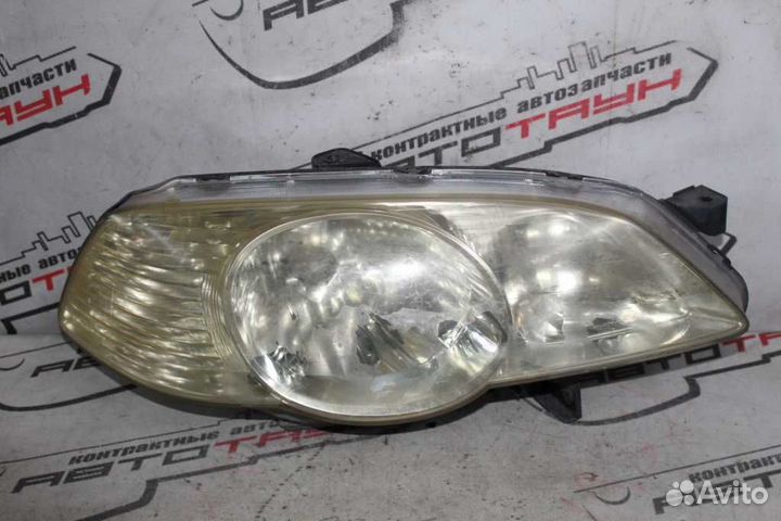 Фара honda odyssey RA6 RA7 RA8 RA9 0648 светлый хр