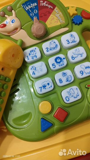 Детские игрушки телефон