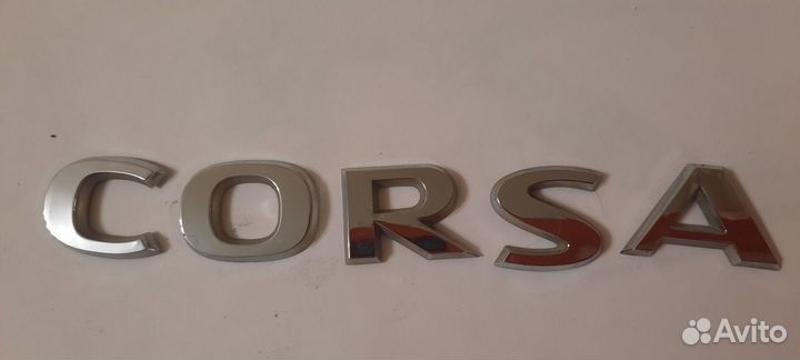 Эмблема, значки Opel Corsa D