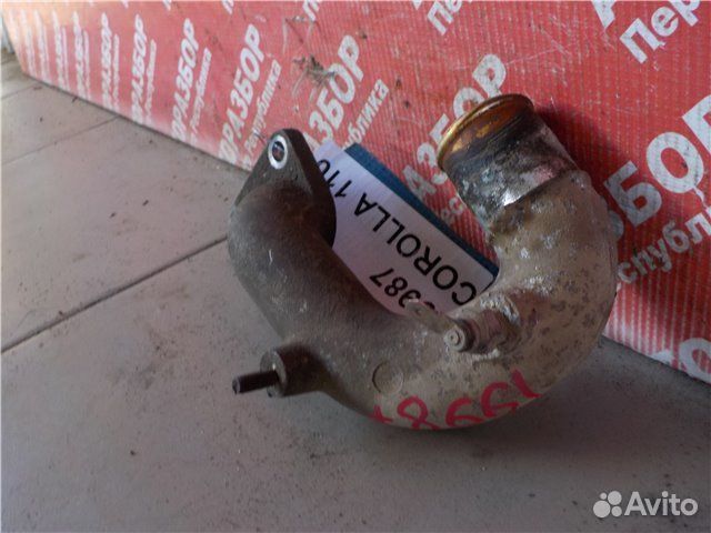Коллектор водяной Toyota Corolla AE110 5A-G521011