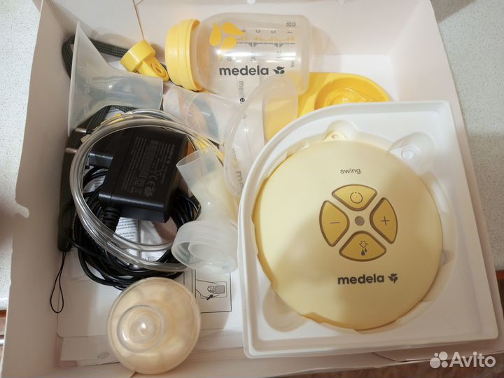 Молокоотсос medela электрический
