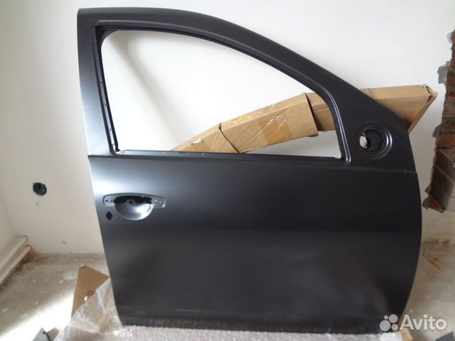 Обшивка дверь передняя duster renault 2012