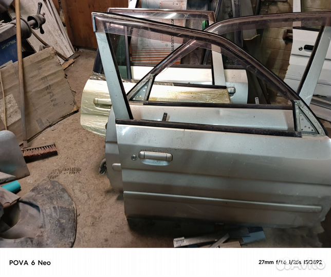 Дверь на mazda demio